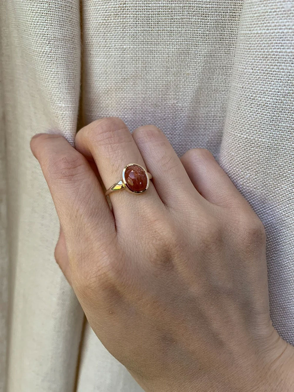 Gold Solitaire Ring with Polished Sunstone Gemstone