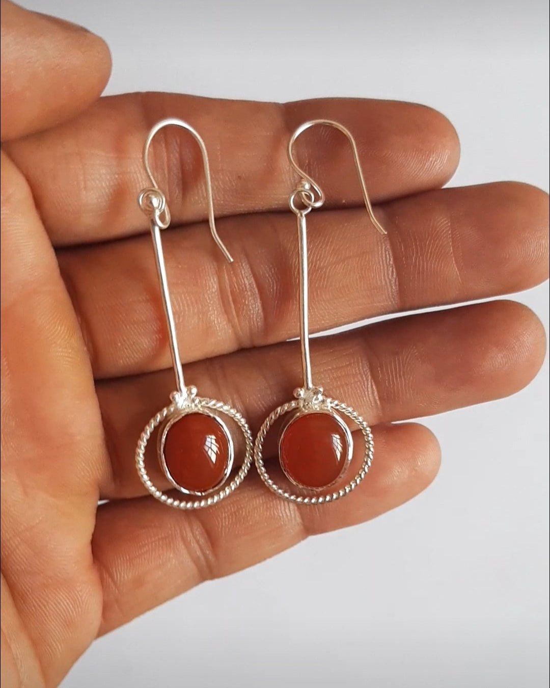 Carnelian, smooth round, 10mm bezel, silver, dangle