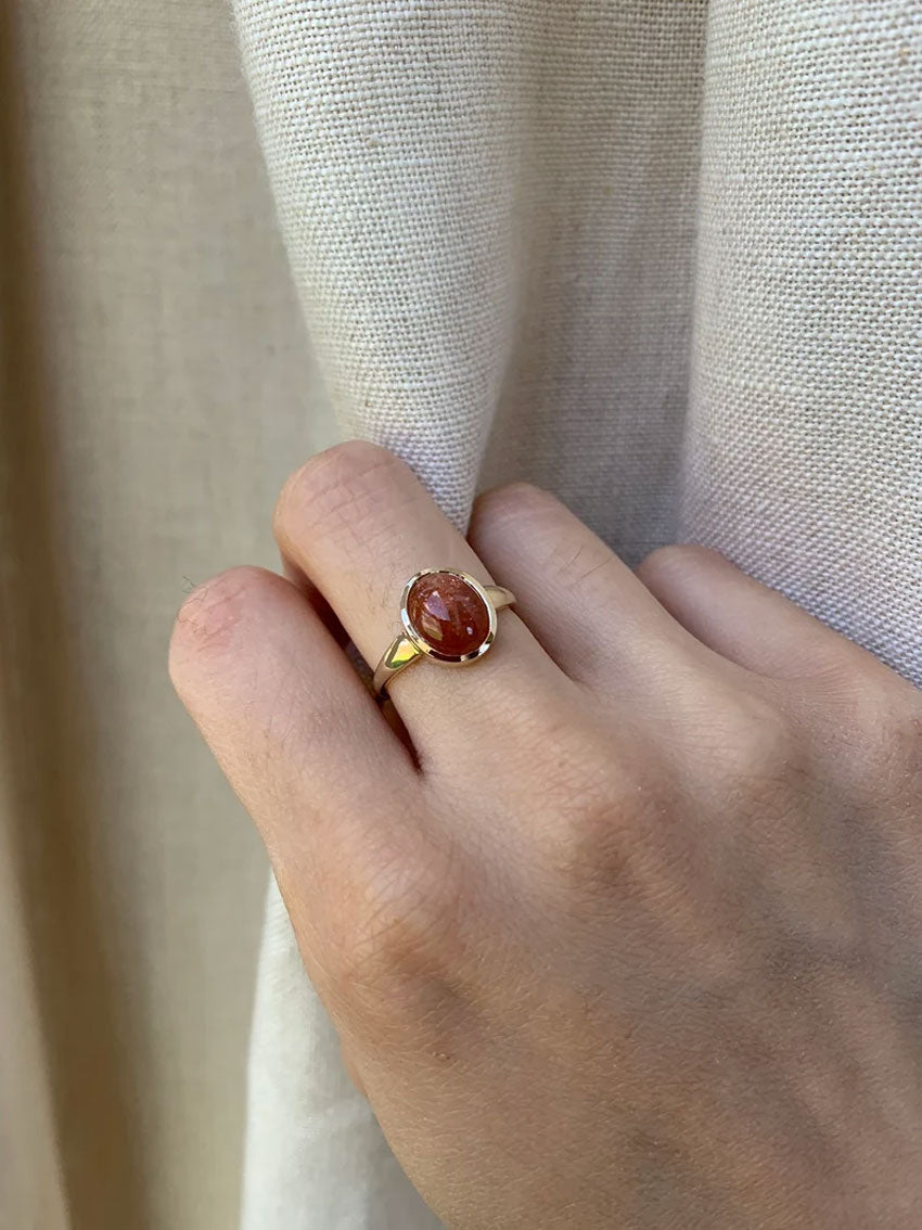 Gold Solitaire Ring with Polished Sunstone Gemstone