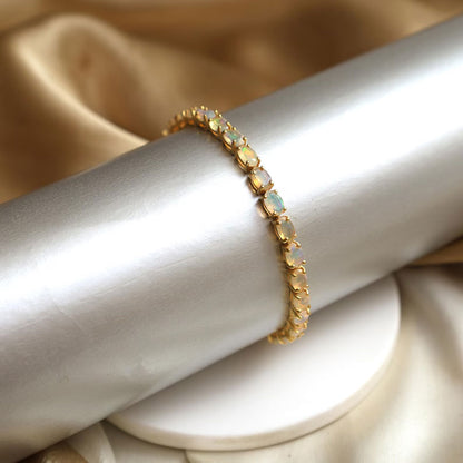 2025 Trendy 925 Sterling Silver  Gold Plated Bangles 5X7MM Oval Shaped Ethiopian Opal Gemstone Prong Setting For Anniversary Gift Women or Men Jewelry For Her