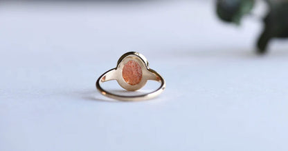Gold Solitaire Ring with Polished Sunstone Gemstone