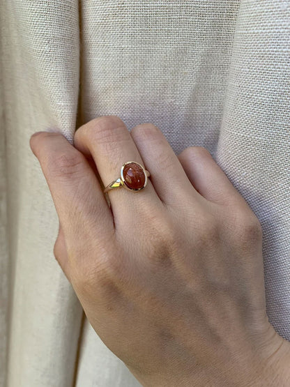 Gold Solitaire Ring with Polished Sunstone Gemstone