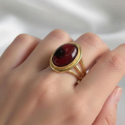Classic Gold Triple-Band Ring with Oval Garnet