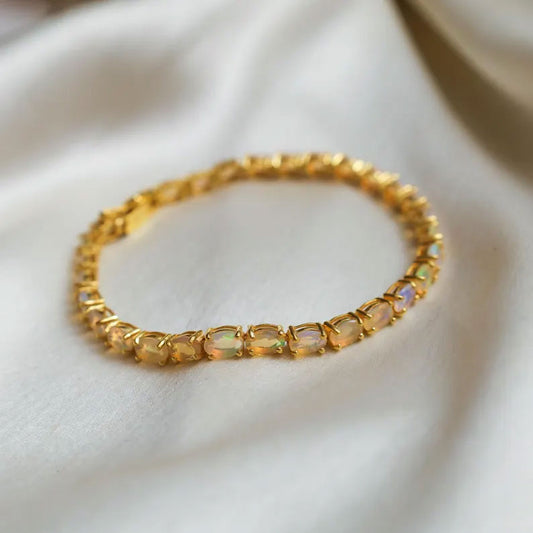 2025 Trendy 925 Sterling Silver  Gold Plated Bangles 5X7MM Oval Shaped Ethiopian Opal Gemstone Prong Setting For Anniversary Gift Women or Men Jewelry For Her