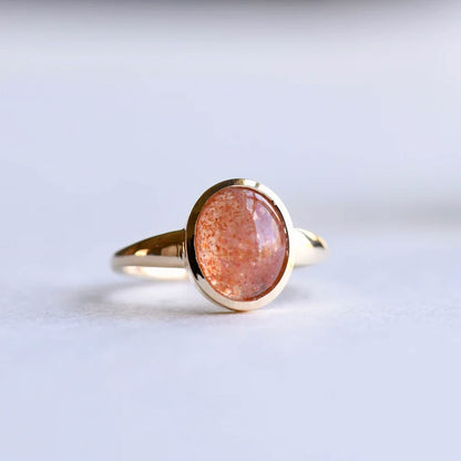 Gold Solitaire Ring with Polished Sunstone Gemstone